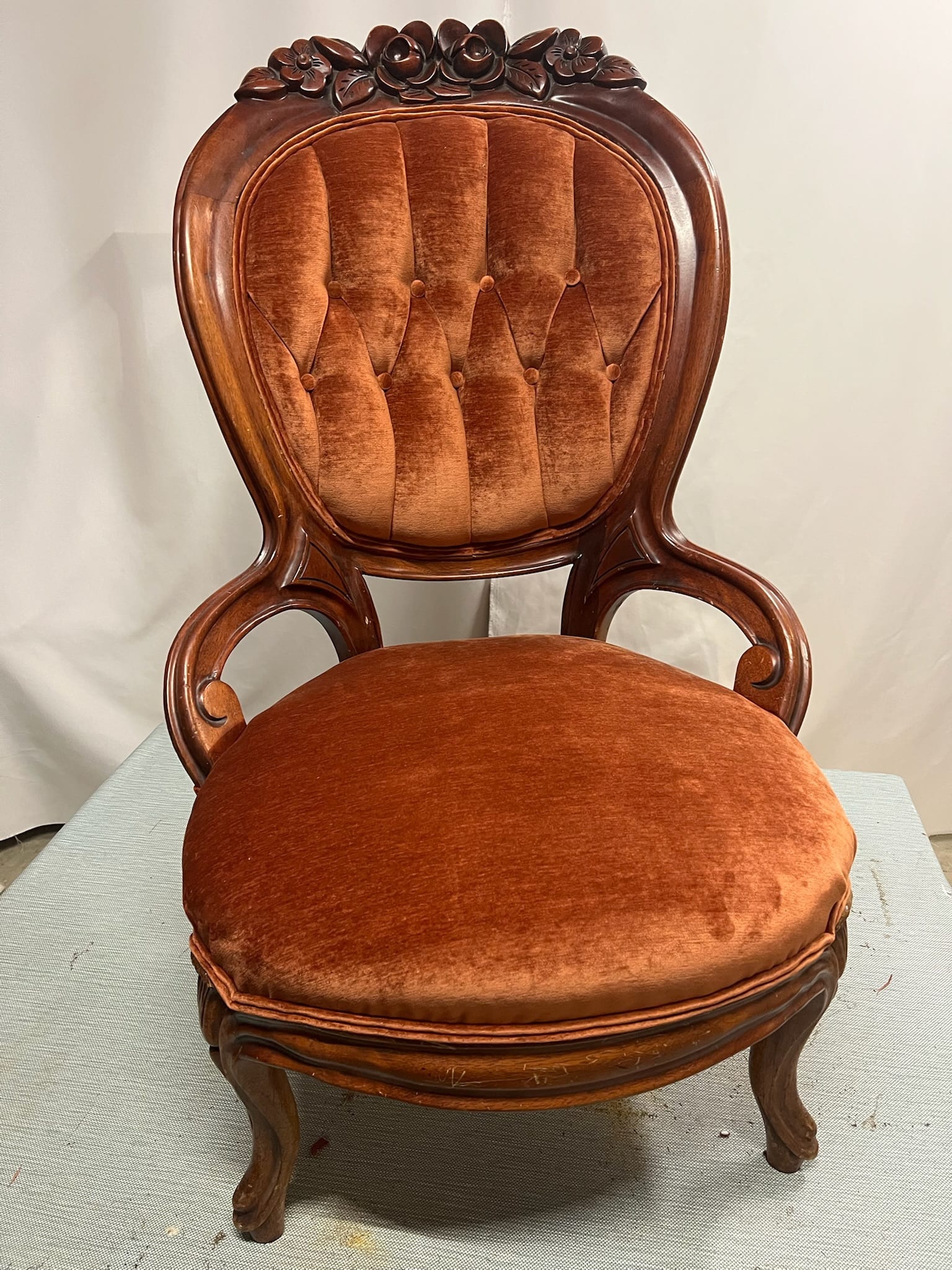 Antique Victorian-style chair reupholstered in burnt orange