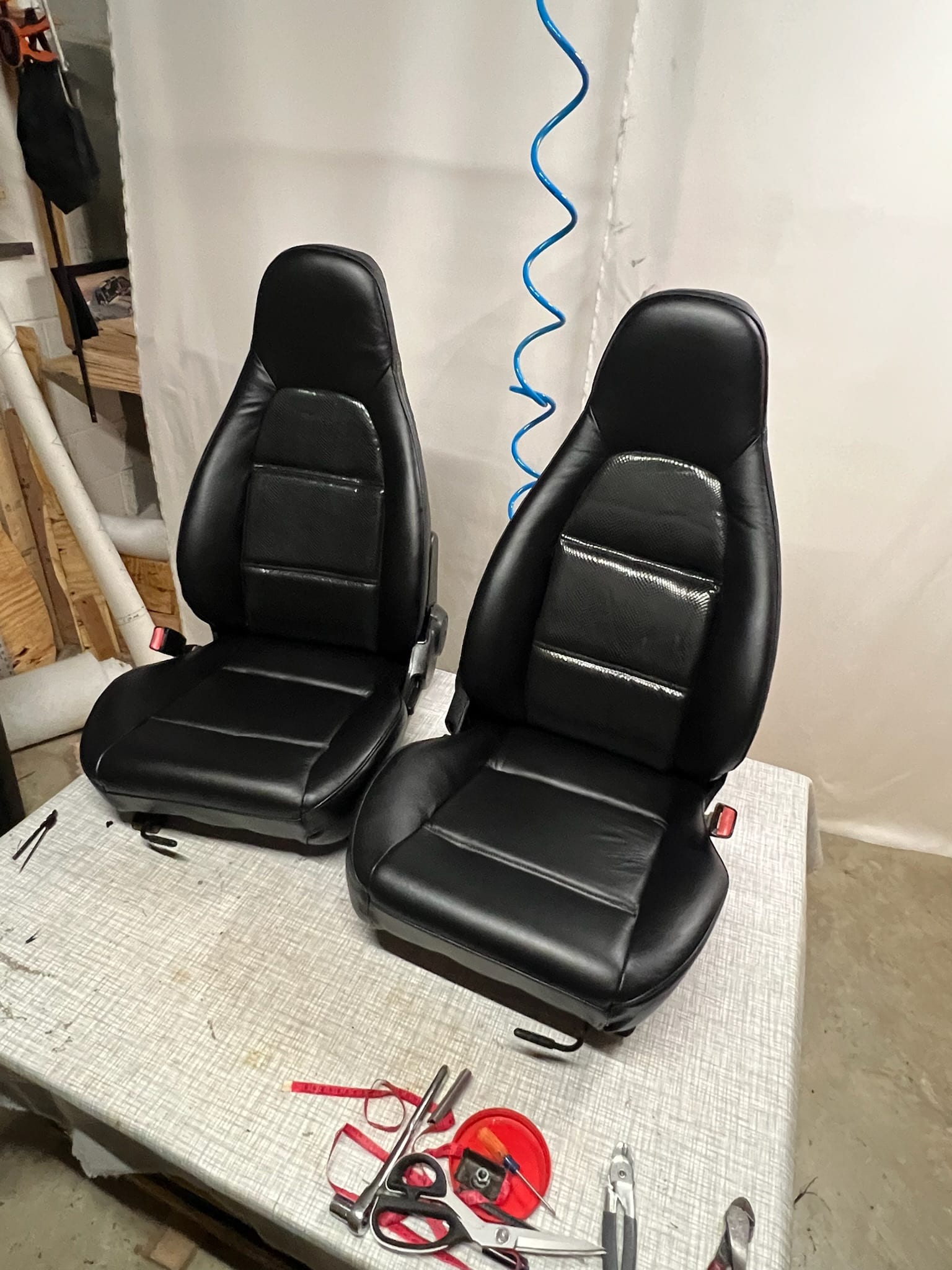 Black bucket seats reupholstered for a classic car