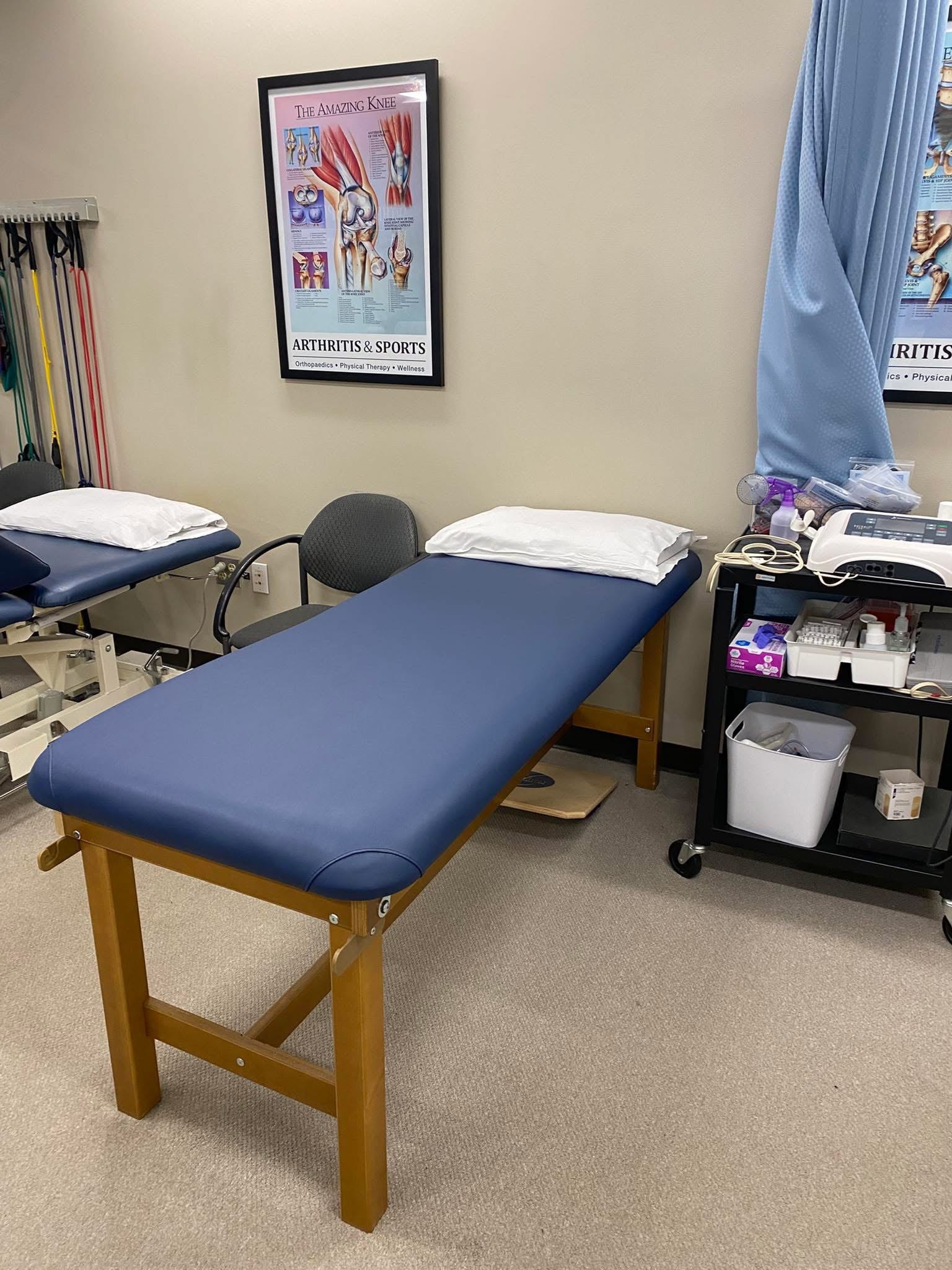 Blue vinyl chiropractic table reupholstered