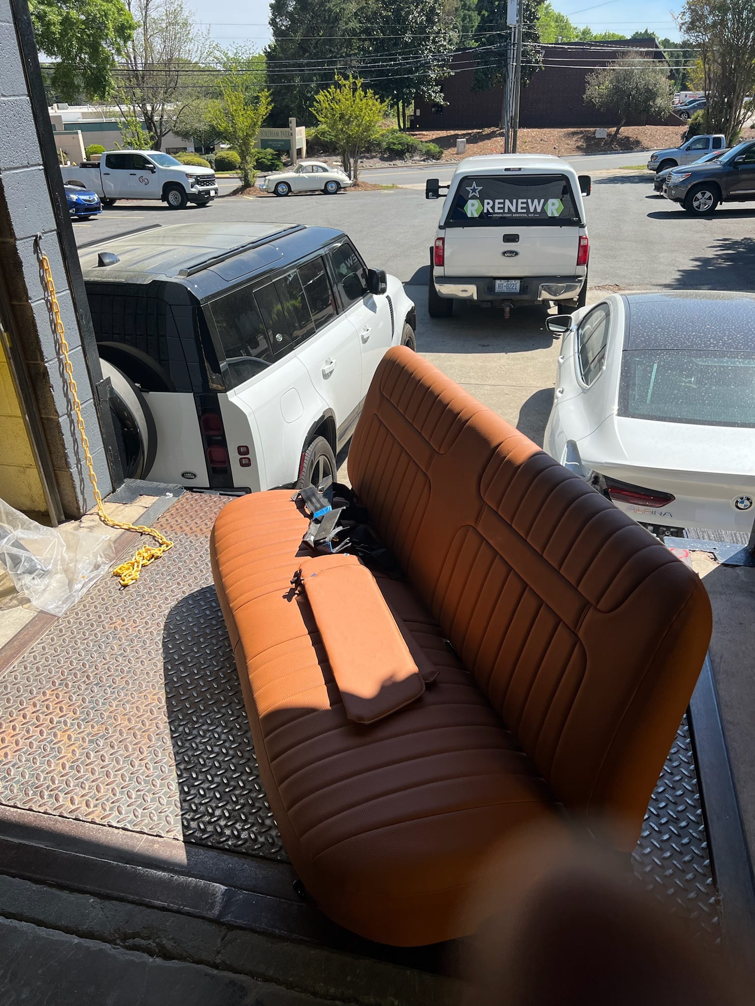 Classic truck bench seat in orange and saddle