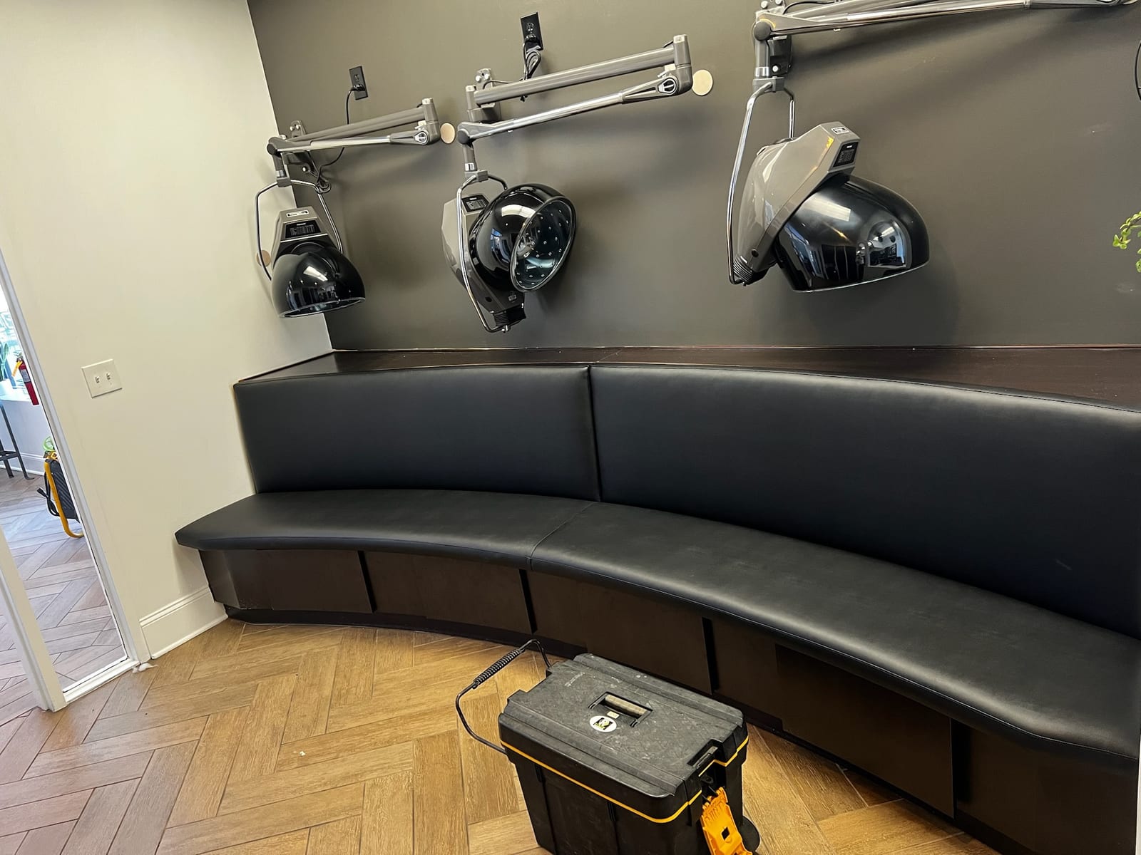 Curved salon bench upholstered
