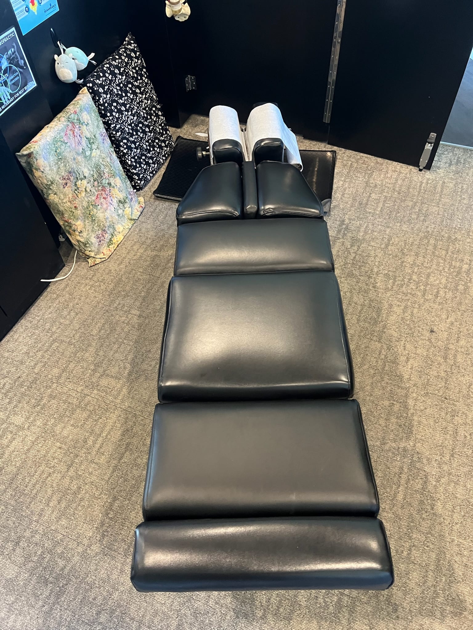 Black salon shampoo chair reupholstered